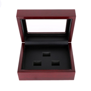 Reddish brown wooden jewelry box with a clear window and three slots for rings