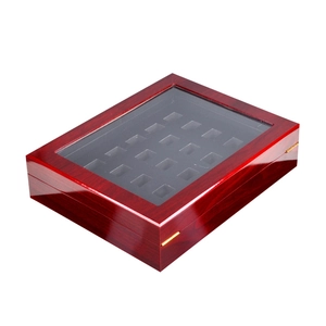 Reddish brown wood display box with 20 slots and glass lid for rings and coins