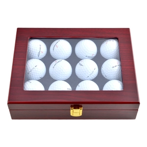Solid wood golf ball display case with glass lid and twelve white golf balls