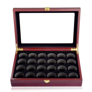 Detail of mahogany finish golf ball display case with 24 slots and gold metal latch