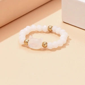 Elastic cat ring with natural mother-of-pearl beads and golden accents for women