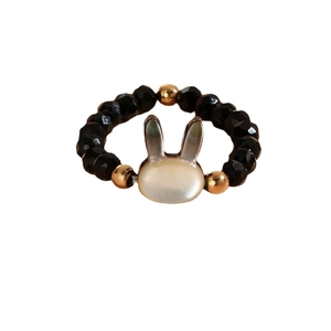 Cute bunny rabbit ring with iridescent shell charm and black faceted beads elastic band