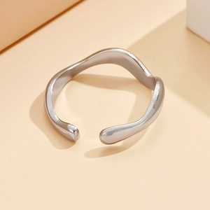 Minimalist silver wavy irregular stainless steel open ring with polished metal finish