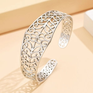Vintage hollow flower stainless steel open bangle with intricate retro pattern