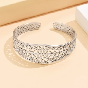 Vintage hollow flower stainless steel open cuff bracelet with intricate palace style design