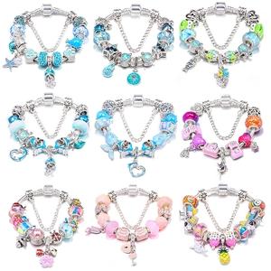 Nine styles of charm bracelets with glass beads and enamel pendants on snake chains