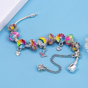 Beaded snake chain bracelet featuring colorful butterfly and hope heart charms