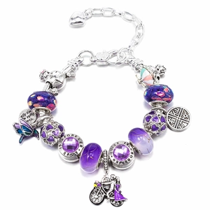 Bracciale regolabile con perline argento e viola con ciondoli a forma di cuore e uccello