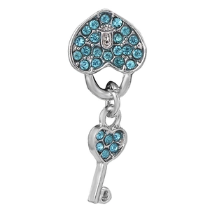 Luxurious blue crystal heart charm and silver key pendant with sparkling rhinestones