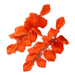 Fashionable long orange rose petal drop earrings with gold chains on white background