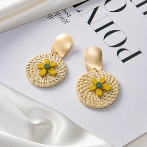 Bohemian woven rattan flower drop earrings with golden curved studs for women