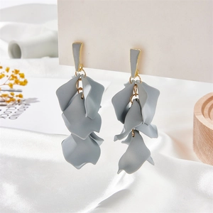 Detailed view of Morandi grey three-layer matte petal long tassel earrings on a display card