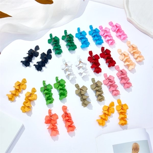 Exaggerated matte tiered flower petal tassel earrings in various vibrant colors