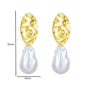 Detail view of baroque pearl earrings with gold hammered metal and size dimensions