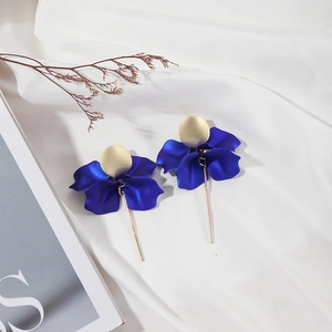Deep blue petal drop earrings with gold textured studs and elegant long metal dangles
