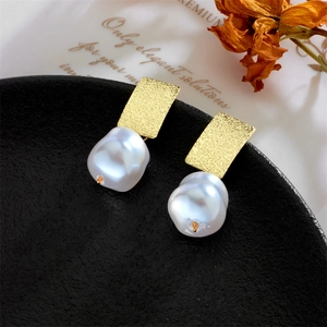 Vintage Baroque irregular pearl drop earrings with geometric gold finish metal accents