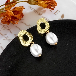 Baroque pearl drop earrings with irregular gold hammered studs in vintage style