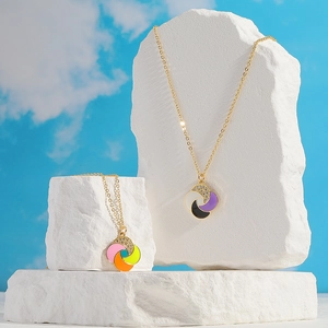 Minimalist windmill pendant necklace with colorful enamel inlay and sparkling zircon stones
