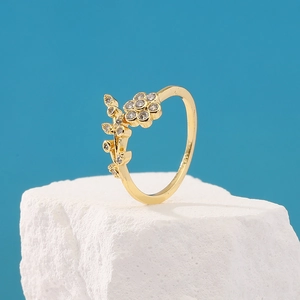 Anillo ajustable de plata S925 bañada en oro con flor de circón y motivo de hoja