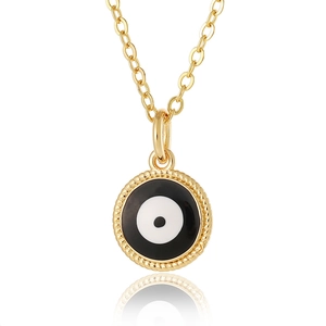 Macro shot of gold Evil Eye pendant necklace with blue enamel and braided metal frame