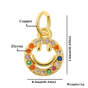 Macro detail of 14mm copper smiley face pendant with multi-color zircon stones