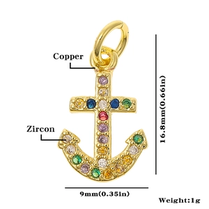 Detail view of a 16.8mm gold copper anchor pendant with colorful zircon stones