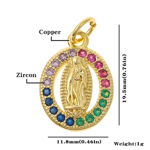Detailed macro view of gold plated Virgin Mary pendant with colorful zircon stones