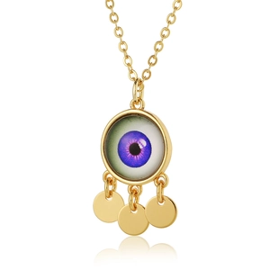 Gold evil eye necklace with purple iris and three dangling gold sequins on white background