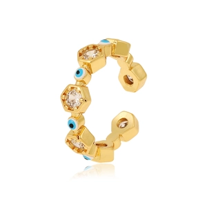 Detailed close-up of a gold-tone evil eye cuff ring featuring hexagon zircon studs