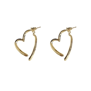 Elegant gold-plated metal crossover heart earrings with asymmetrical streamlined design