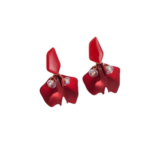 Matte red flower petal earrings with colorful crystal beads on a white background
