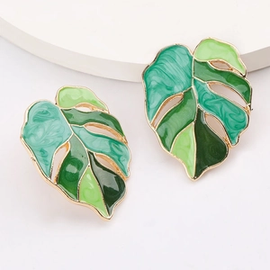 Tropical monstera leaf earrings with green enamel and gold plated alloy edges