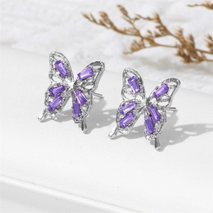 Elegant silver butterfly stud earrings with purple zircon stones and hollow design