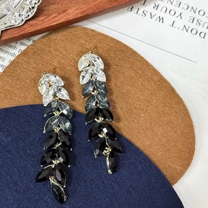 Elegant gold drop earrings featuring gradient marquise crystals in leaf fringe design