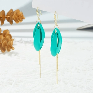 Teal petal tassel drop earrings with gold chains and zircon accents on white lace background