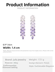 Macro detail of long tassel gradient purple crystal wheat earrings with alloy setting