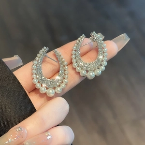 Chic silver U-shaped hoop earrings with sparkling rhinestones and white pearls