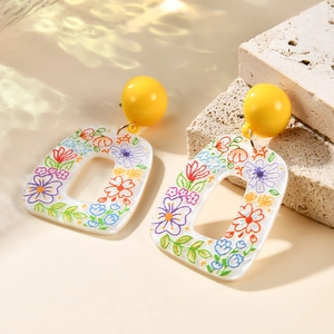 Fashionable acrylic pop-art floral drop earrings with yellow studs and floral prints