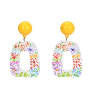 Floral acrylic drop earrings with yellow studs and colorful printed resin charms