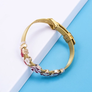Bracciale in maglia d'acciaio dorato con ciondoli natalizi smaltati e Babbo Natale