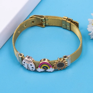 Adjustable golden mesh bracelet with rainbow ladybug and sunflower charms on blue background