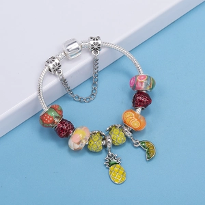 Silver snake chain bracelet featuring colorful fruit charms like pineapple and strawberry