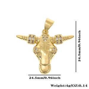 Detailed view of gold plated bull head pendant with dimensions of 24.5mm and 4g weight