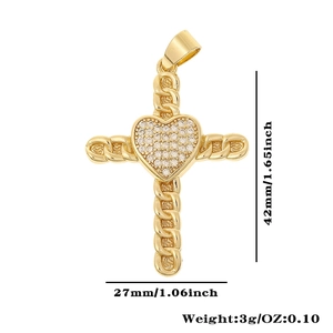 Detail of gold cross pendant with cubic zirconia heart and woven chain texture