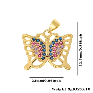 Macro shot of gold butterfly pendant with colorful zircons, size 22.5mm by 22mm