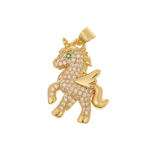 Golden unicorn pendant necklace with white crystals and green gemstone eye on white background