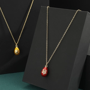 Exquisite Fabergé-style enamel egg pendant necklace with micro-set zircons and gold chain