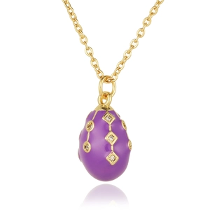 Macro view of purple enamel egg pendant necklace with gold grid and zircon inlay