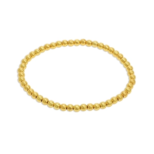Detail of 18K gold plated beaded bracelet with retro textured matte finish beads