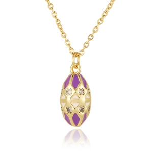 Detailed macro view of purple enamel egg pendant necklace with gold chain and crystals